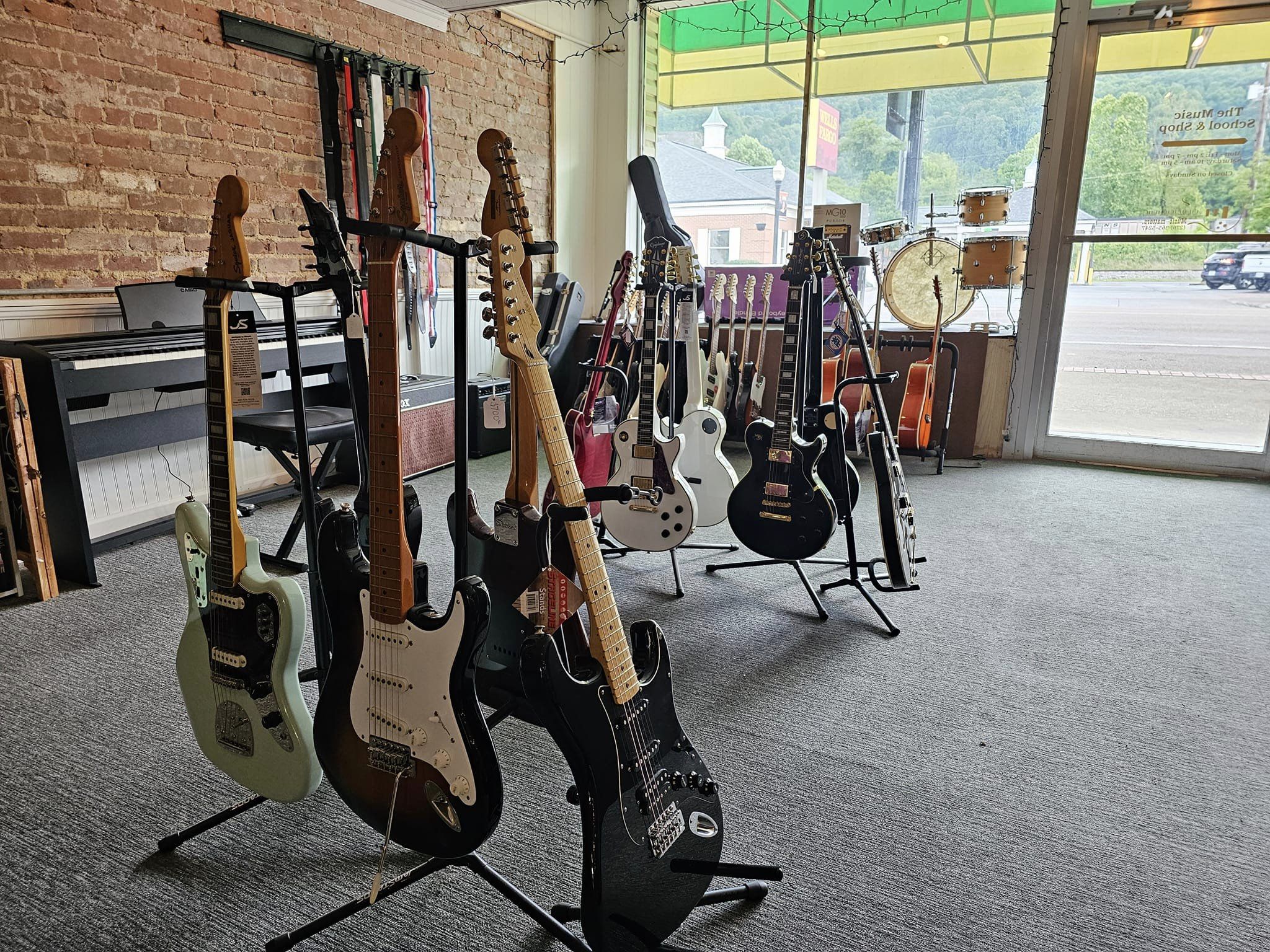 Guitars on display at the Music School and Shop