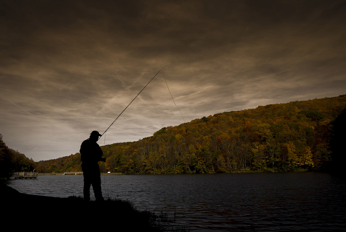 Person fishing at Norton Reservoir.